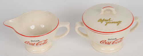 COCA-COLA CHINA SUGAR BOWL AND CREAMER: These are circa 1930s dinnerware pieces; clean and bright with only miniscule marks; no wear; very faint stains; condition 9.5+/NM