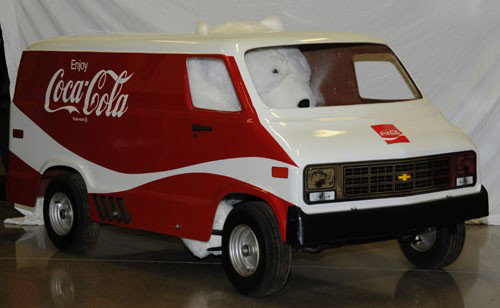 CHILD'S COCA-COLA CHEVY VAN: 74" long; circa 1980's; the van is Fiberglas with a gas powered Briggs & Stratton 3 hp-127 cc 4-cycle motor by F.W. & Associates; nice details including dynamic contour, decals and side pipes; conditi