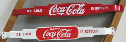 2 COCA-COLA PORCELAIN 1950'S DOOR BARS: Both measure 4" x 35"; both bars present very well with only some small edge chips and nicks; they continue around the turns to the back in a few spots; condition 8 to 8.3+/EX