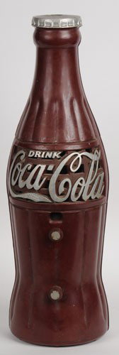 1930'S COCA-COLA BOTTLE RADIO: 24" tall; not currently operational but displays well overall; some of the silver highlights have old repaint that was nicely done; bottle is generally soiled with a number of small random green paint
