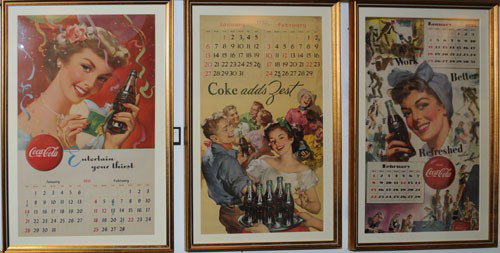 1951, 1952, 1953 COCA-COLA CALENDARS: All 3 are nicely matted and framed under glass; '51 and '53 show little to no wear or marks; the '52 shows only light wear and medium soiling; condition 8 to 9.5 / EX to NM