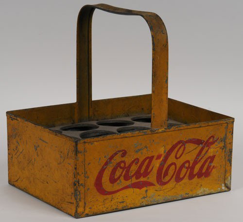 EARLY AND RARE COCA-COLA 12 BOTTLE METAL CARRIER: 11 1/2" x 9" x 11 1/2" tall; late teens to early twenties; the 12 bottle dividers is one-piece metal construction with spot-welds on the side of the carrier; still retains good yellow and red paint on