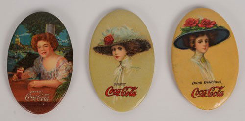 1909, 1910, & 1911 COCA-COLA POCKET MIRRORS: The 1909 and 1910 have a good luster with minimal marks and surface wear; the 1911 is slightly dull and has quite a bumpy surface; condition 7.5 to 9/VG to NM