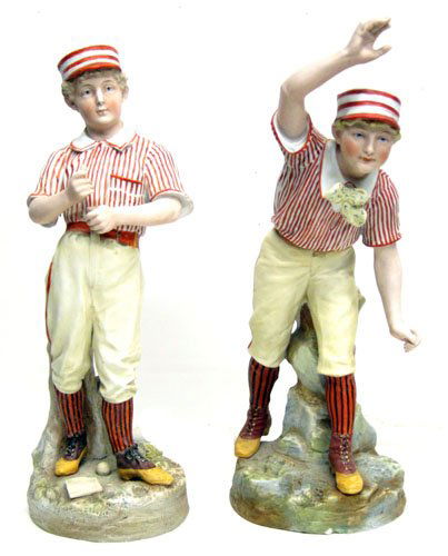 (2) HEUBACH BISQUE BASEBALL PLAYERS: (1) pitcher: right finger loss, loss on bow, small chip on base and hairline in back of base; (1) batter: missing bat and small chip in base; H-16"-17", F-G