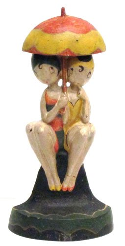 FISH BATHING BEAUTIES DOORSTOP: Painted cast iron; some paint crazing and wear; H-11", G-VG