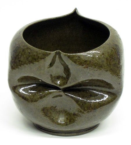 GEORGE OHR CERAMIC BOWL: Opening is heart shaped; collapsed pinched front; dark greenish brown glaze; stamped, "G.E.Ohr - Biloxi Miss"; H-3 3/4", VG-EX