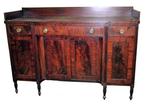 SHERATON SIDEBOARD: Flame mahogany panels; turned feet; H-48", L-67", VG-EX