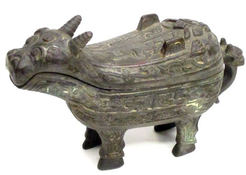 ORIENTAL BRONZE ANIMAL VESSEL: Possibly Shang Dynasty; relief decorated; (2) pieces, mouth is spout; H-5 1/2", L-8 1/2", G-VG