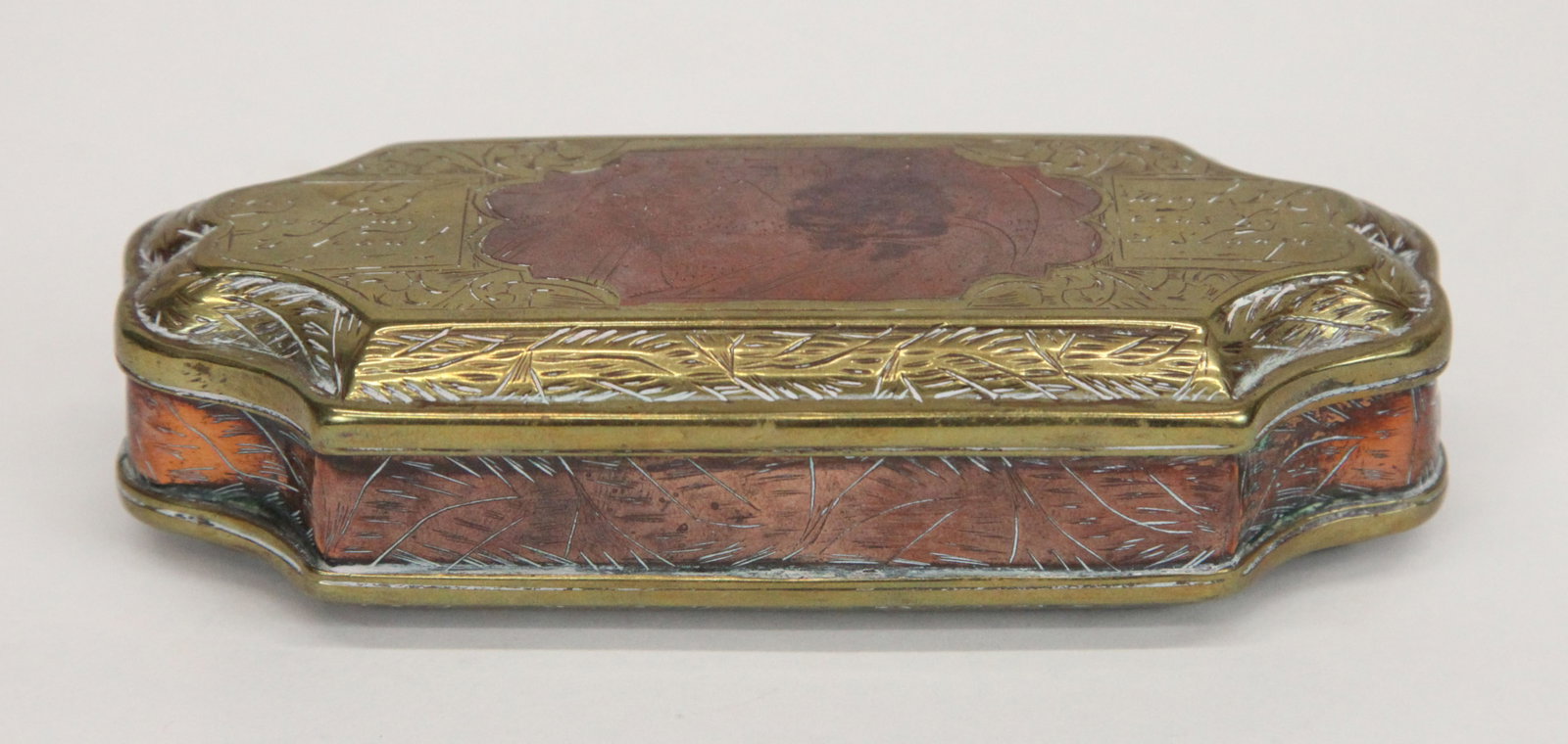 EARLY SPECTACLE BOX: Brass with copper inlay panels, engraved designs with courtship scenes and verse; wear; L-5 1/4", G-G+