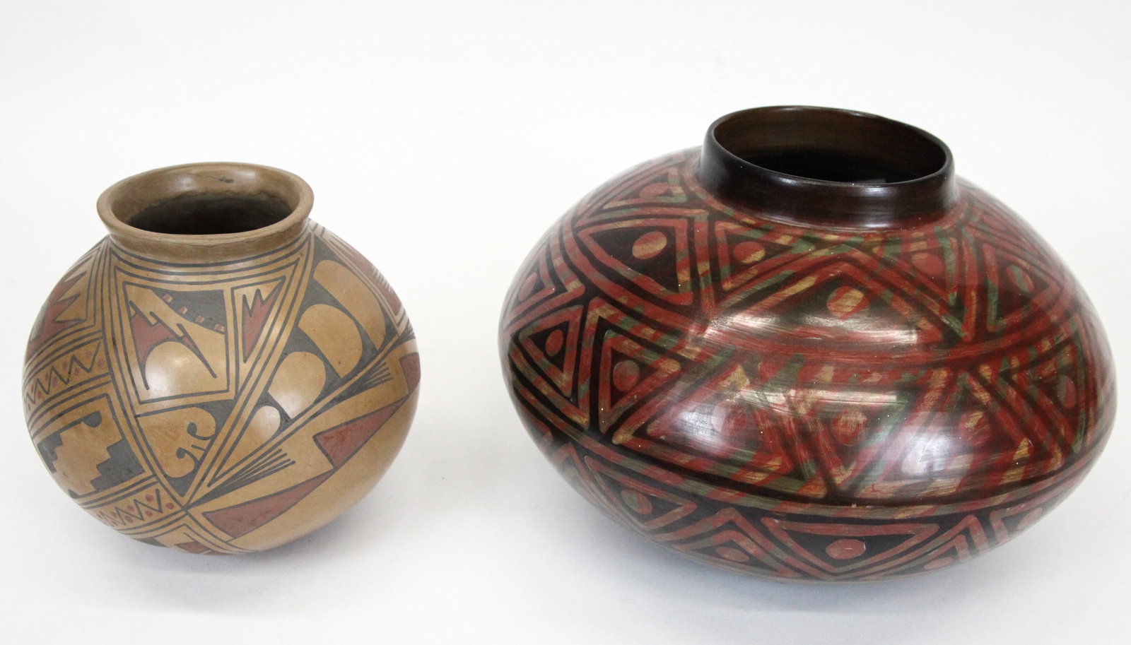 SOUTHWEST/ PERU POTS (2): Decorated clay, (1) Geometric, unsigned, H-7"; (1) multi-colored triangles and dots, Peru, Juan Paz Arismendiz, Chulucana, H-8", VG-EX