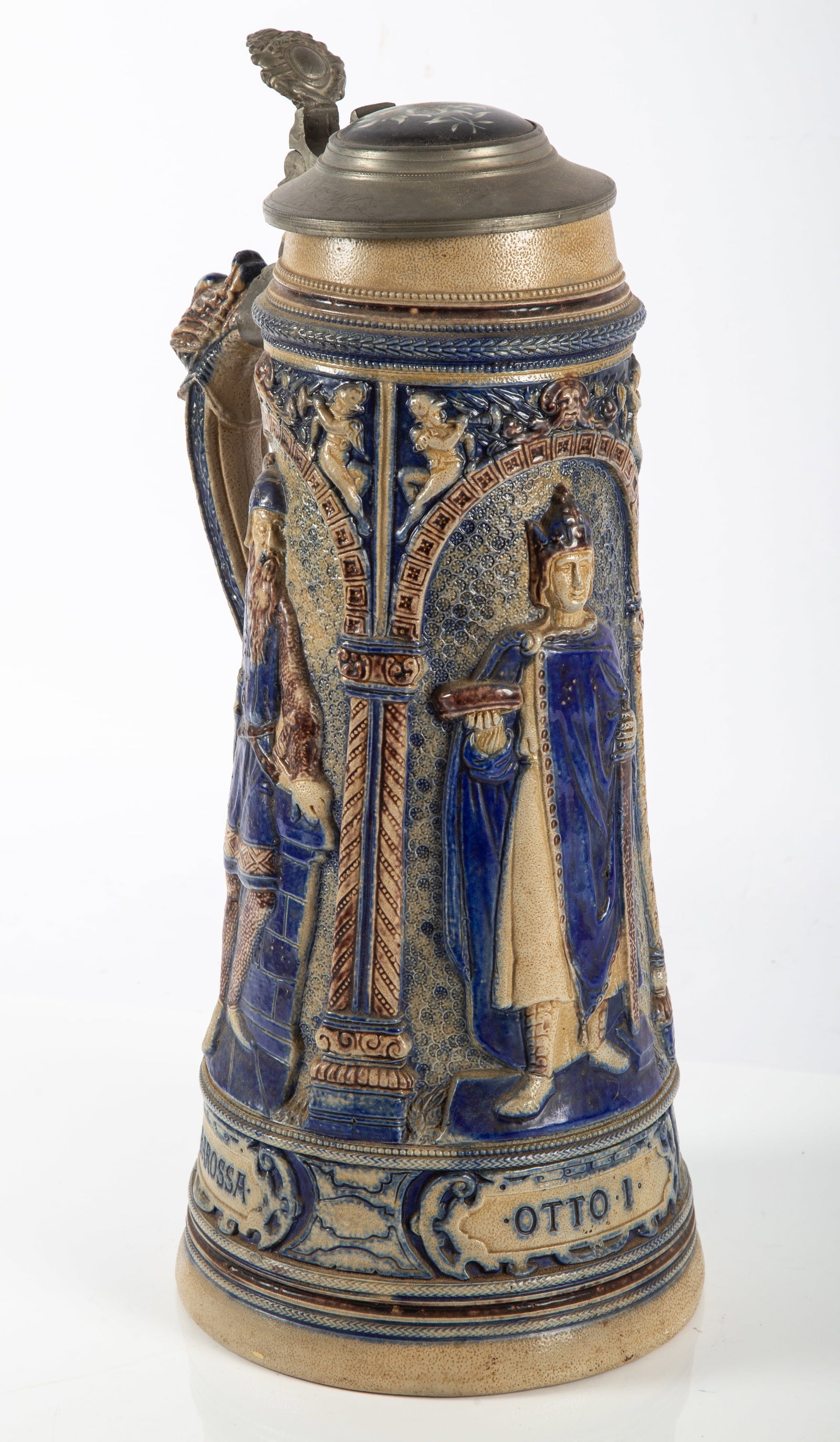 TANKARD STEIN: Ceramic with relief figures of Heinrich I, Otto I, Barbarossa; stamped 841, incised 13; pewter hinged lid with painted porcelain floral insert; normal wear; H-17", G-VG