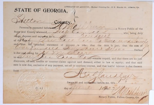 1907 ASA CANDLER SIGNED AFFIDAVIT: 5 1/4" x 7 1/2". Asa Candler says he is the president of the Coca-Cola Company and Joseph M. Kerr has an unpaid debt of $154.31 owed to the Coca-Cola Company. The document bears Asa Candler's original