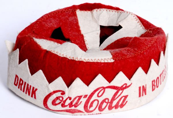 RARE COCA-COLA SMALL FELT HAT: 1940s-50s. Cool design with light wear and soiling and a small tear at the stitching at the top side for just under two inches. Easily repaired or enjoyable as is. Condition 7.5 plus