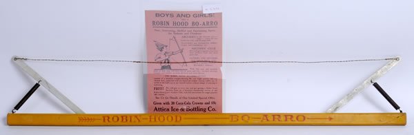1930-31 COCA-COLA ROBIN HOOD BO-ARRO AND PROMOTION: 5" x 31" The wire appears original and only light wear and slight fading on the Coca-Cola side with a small wood split on the bow. Condition 8.2 to 8.6 / EX