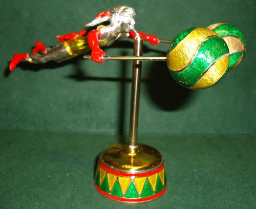 GENE MOORE CIRCUS WOMAN EQUILIBRIST: sterling silver & enameled & vermeil; 4" in height; 5 1/2 " in length, VG-EX