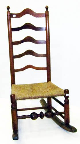 LADDER BACK BULBOUS ROCKER: (5) Shaped horizontal splats; rush seat; bulbous turning; H-39", G-VG
