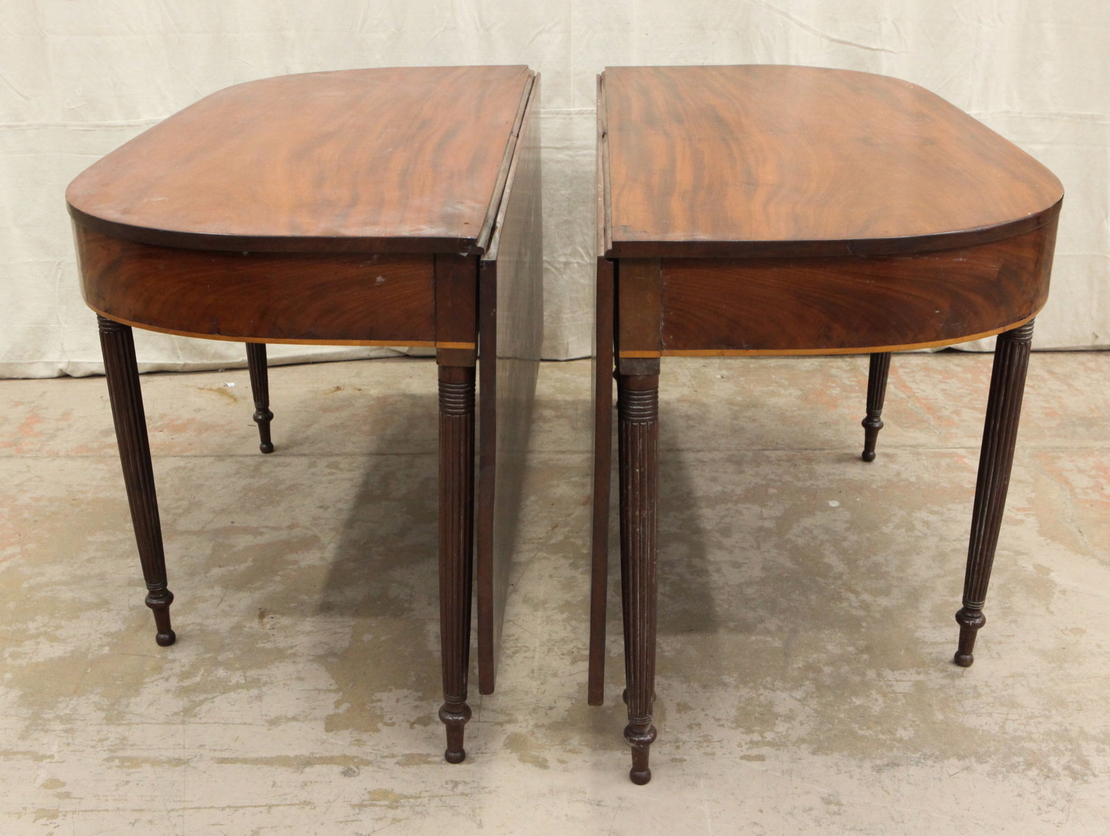 ANTIQUE BANQUET TABLE: Mahogany, turned reeded legs, small break and loss on one hinge on top; normal wear; H-29", width 52", open L-90", G