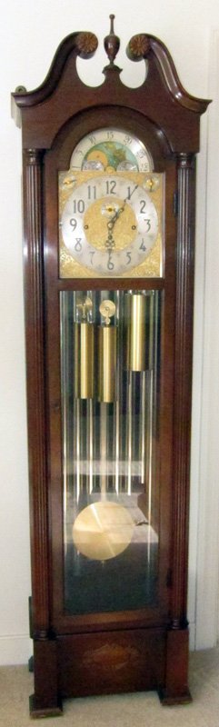 HERSCHEDE HALL CLOCK: Mahogany case, model #217; weight driven; moon dial with 9 tubular chimes; Whittington, Westminster, Canterbury chimes; H-81", W-21", VG