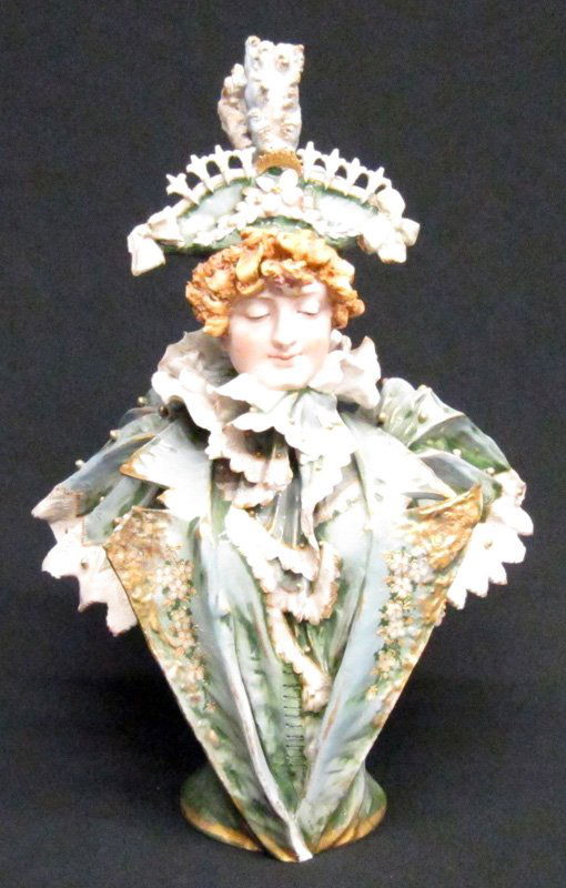 R.S.K. AMPHORA BUST: Painted porcelain; red R.S.K. Turn Teplitz; some damage and repair to hair, flowers and jacket; H-17", F-G