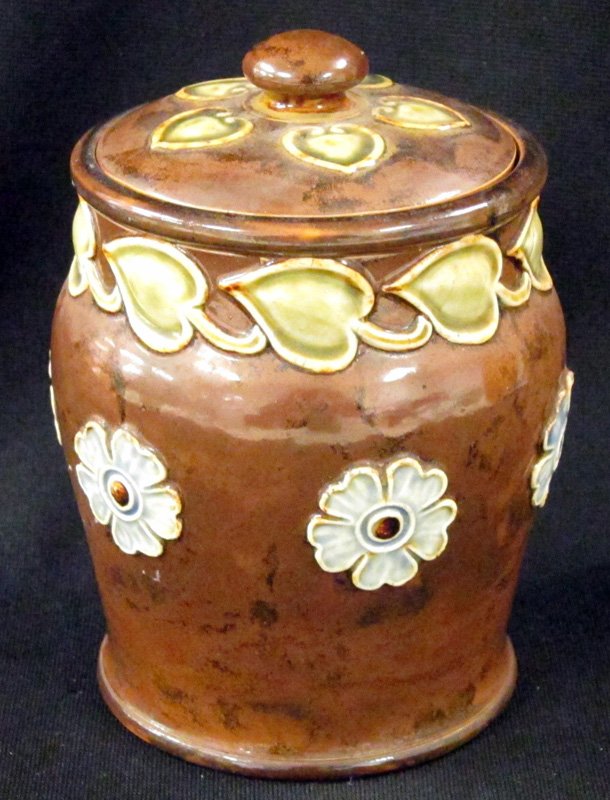 ROYAL DOULTON TOBACCO JAR: Lambeth style ceramic; applied lily pad and Art Nouveau decoration; H-6", VG-EX