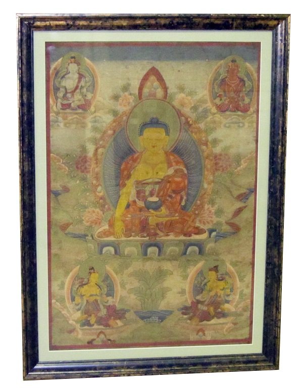 EASTERN PAINTING ON FABRIC: Buddhist iconography; framed