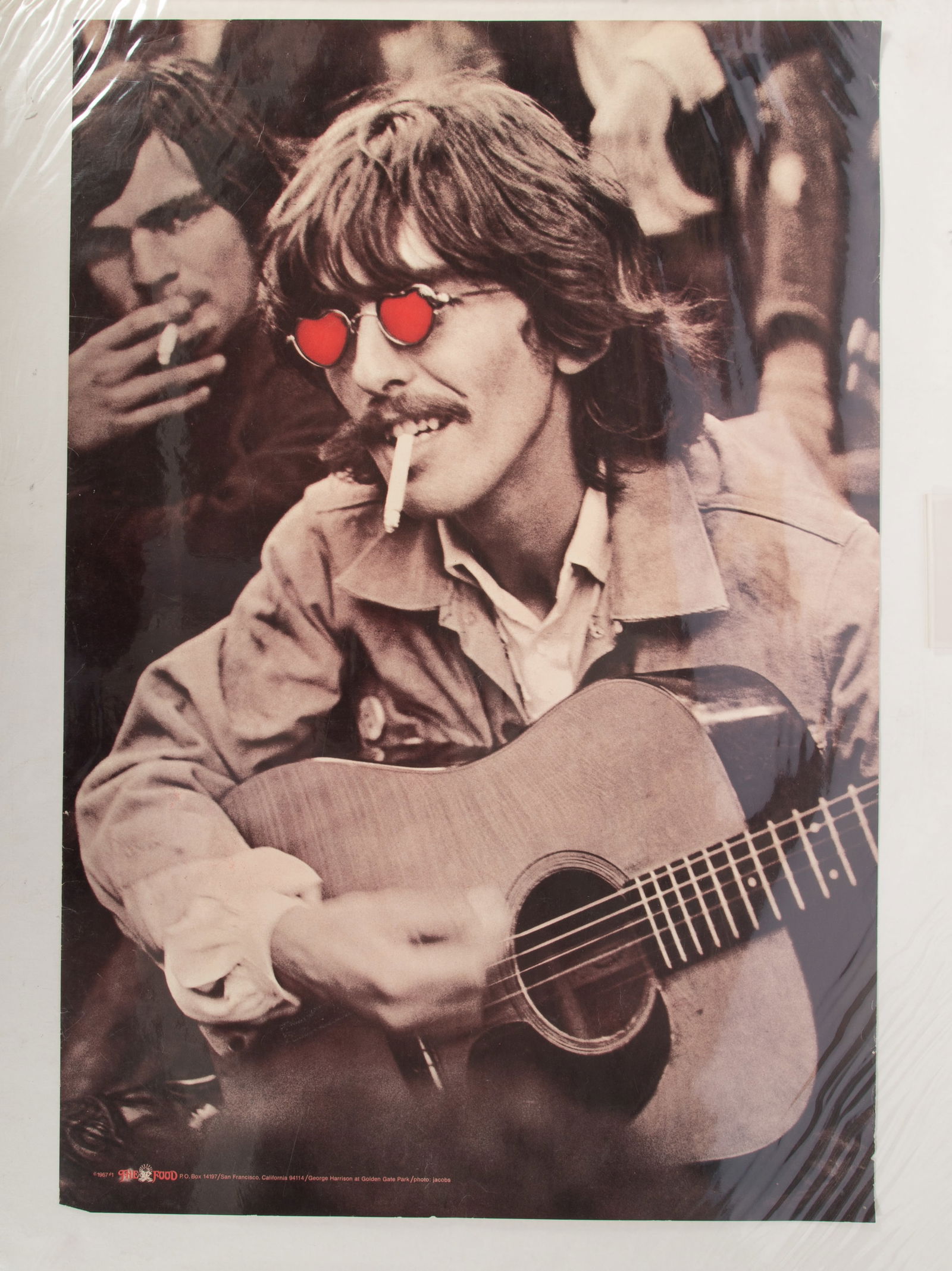 VINTAGE BEATLES HARRISON POSTER: George Harrison at Golden State Park, 1967, The Food, photo by Jacobs; private local collection of rock & roll posters; edge wear; pin holes in corners; bottom left corner chipped; 35" x 23", G