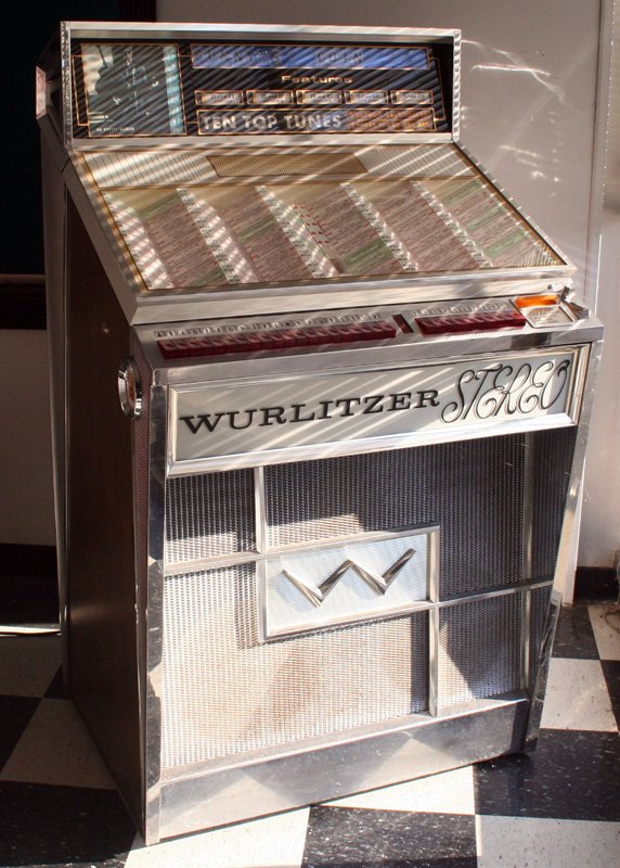 WURLITZER STEREO JUKEBOX: Multi-selector Model 2700; 5 plays for 25?; chrome and wood case; H-53", W-33", VG-EX
