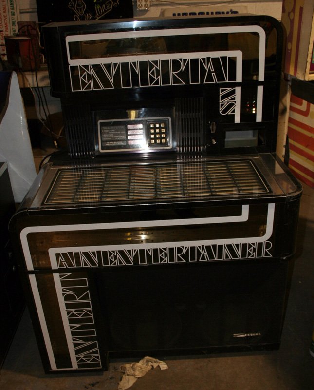 SEEBURG ENTERTAINERS JUKEBOX: Chrome and glass; no titles; as is; H-53", W-40", G