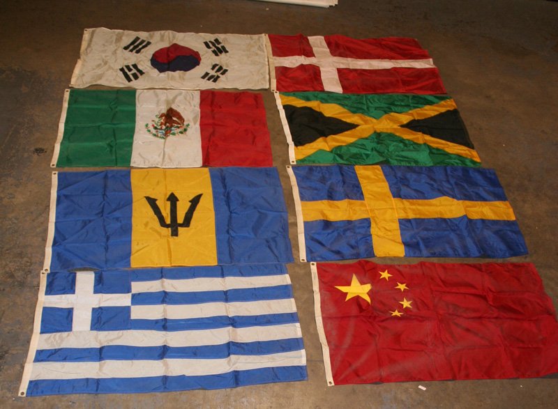 INTERNATIONAL FLAGS (18): Nylon; minor spots on some; overall good condition; 60" x 34", G-VG