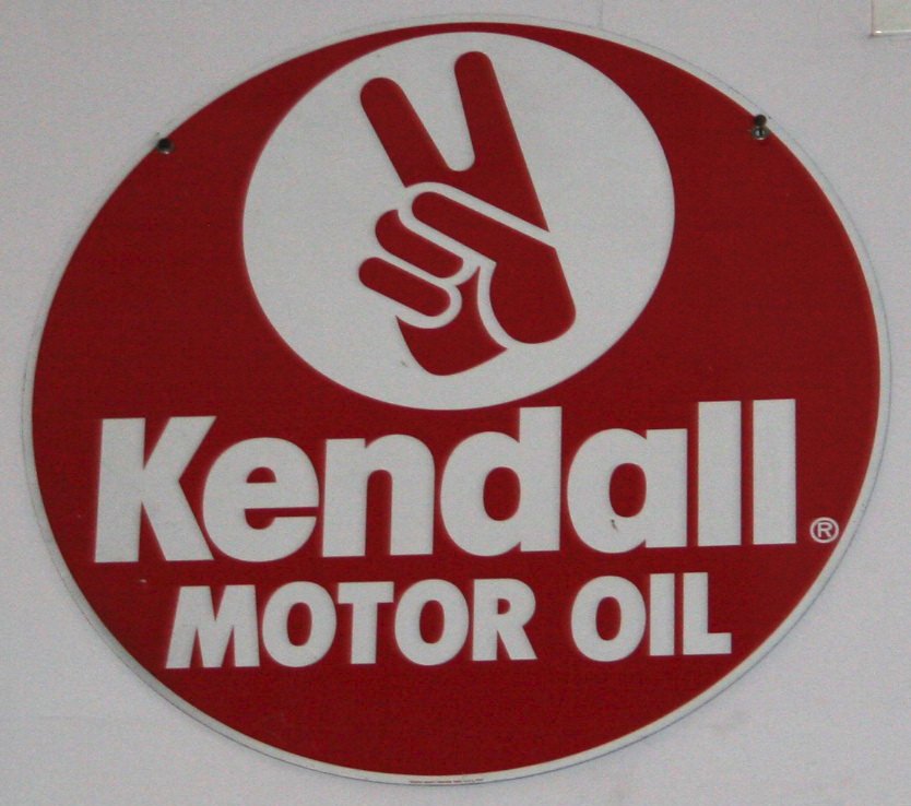 KENDALL MOTOR OIL SIGN: Painted tin; Dia.-23 1/2", EX