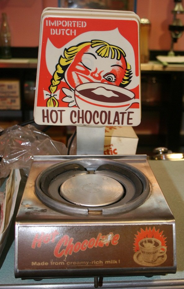 AD MAGIC WHIRL HOT CHOCOLATE ELECTRIC BURNER: metal and plastic; some scratches and scuffs; wear; H-15", F-G