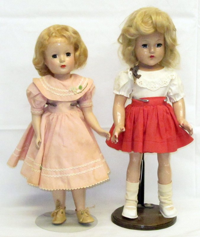 (2) COMPOSITION DOLLS: (1) Effanbee "Anne Shirley" marked on back: composition; sleep eyes; 1/2" crack under chin; overpaint on lips and nails; crazing and paint flaking on legs, hands and tip of nose; (1) Hard plastic doll