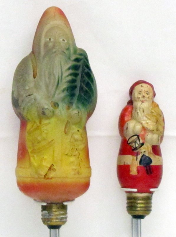FIGURAL SANTA CLAUS NIGHT LIGHTS (2): Molded glass and painted; both light; flaking; H-5 1/2"-8 1/2", G