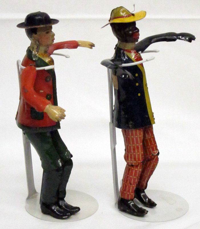 (2) TIN LITHO DANCING TOYS: "Pangee the Funny Dancer" and "Alabama Coon Jigger"; some scuffs and scratches; tape on left and right sides of bodies of both; H-8", G