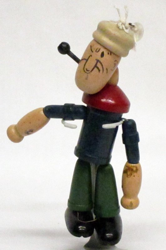 (2) COMIC JOINTED TOYS: (1) Popeye wood string toy: 1930's, painted wood; minor scuffs and marks; (1) Sandy wood string toy: Orphan Annie's dog; painted wood; minor scuffs andmarks; H-6", G-VG