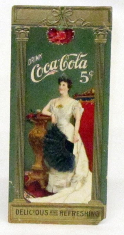 COCA-COLA BOOKMARK: "Drink Coca-Cola 5 ?" Lillian Nordica; litho paper; embossed; creased top; ink writing on reverse; top of back taped; lower right corner loss; 5 1/4" x 2 1/4", G-G+