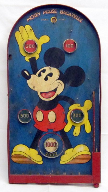 MICKEY MOUSE BAGATELLE GAME: Paper litho on wood; Marx Bros. 1930's; missing balls; some creasing and soiling; H-23 1/2", VG-EX