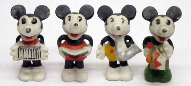 MICKEY MOUSE MUSICIANS (4): Painted bisque; Japan; (3) white shoe, (1) green shoe; original paper label Walter E. Disney; normal wear; H-3 1/2", G-VG