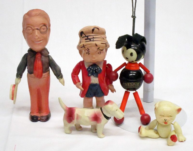 COMIC CELLULOID FIGURES (5): (1) Bonzo; (1) Harold Lloyd; (1) Skippy; (1) Oswald: labeled, (2) small holes in leg; (1) dog; tallest H-7", G-VG