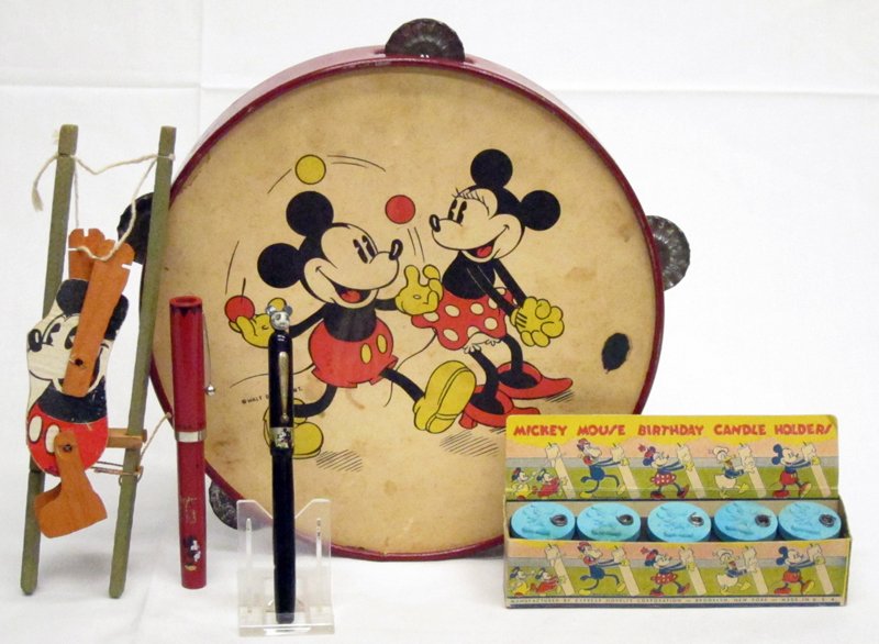 MICKEY MOUSE COLLECTIBLES (5): (1) Birthday candle holders, 1930's, with original box; (1) rare tamborine: metal and paper, small stains; (1) Mickey squeeze trapeze toy: paper and wood; (1) Mickey pen with figural head and engraved