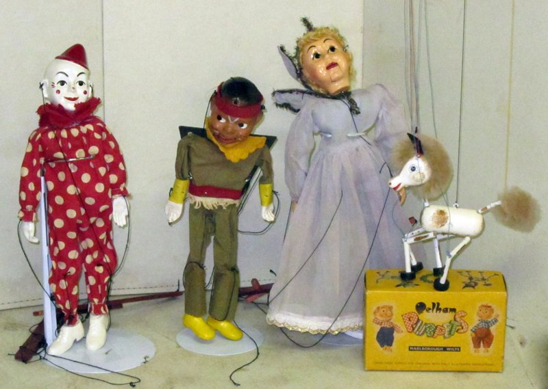 MARIONETTES (4): (1) Pelham "Foal", painted wood with original box; (1) Hazelles "Clown", plastic and cloth; (1) Hazelles "Angel", plastic and cloth; (1) P. Puppet "Indian", painted composition, face crazed; H-7"-14",