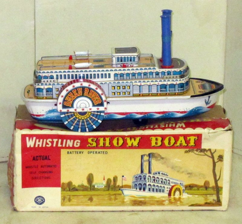WHISTLING SHOWBOAT BATTERY OP: T.M. Japan; litho tin; runs; original box torn and written on, box is G; L-13", EX-NM