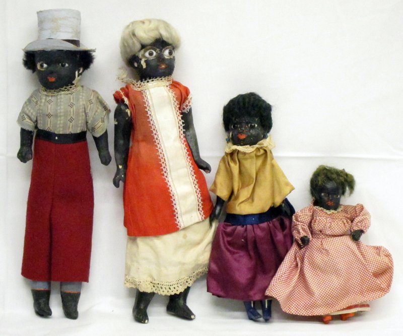 BLACK AMERICANA DOLLS (4): Painted composition or papier mache, fixed glass eyes; paint chipping; one head detached; H-5 1/2" - 11 1/2", P-F