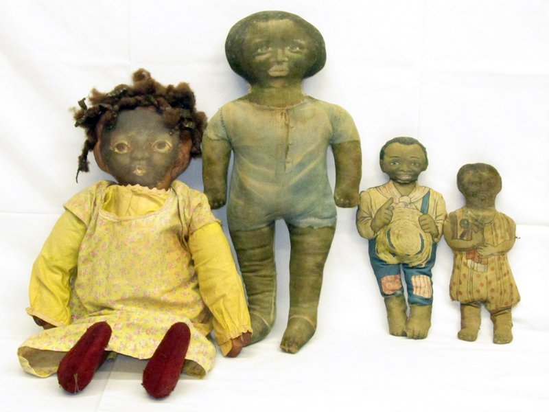 BLACK AMERICANA CLOTH DOLLS (4): (1) Wade Davis, (1) Diana Jemima, (1) untitled, (1) large painted face doll with applied hair; soiled and worn; H-10 1/2" - 20", F
