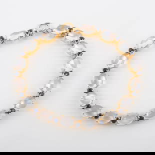 MOONSTONE & SAPPHIRE BRACELET: (15) 1 carat +/- cabochon oval moonstones alternating with (15) .03 carat +/- round sapphires, set in 14K yellow gold, [8.9 dwt total], L-7", VG-EX