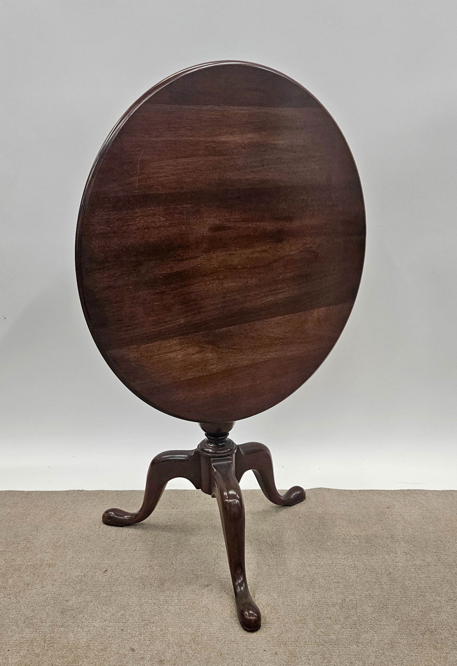 QUEEN ANNE STYLE TILT TABLE: Mahogany; birdcage; turned pedestal; quality reproduction; minor rubs; H-29", Dia.-30", VG