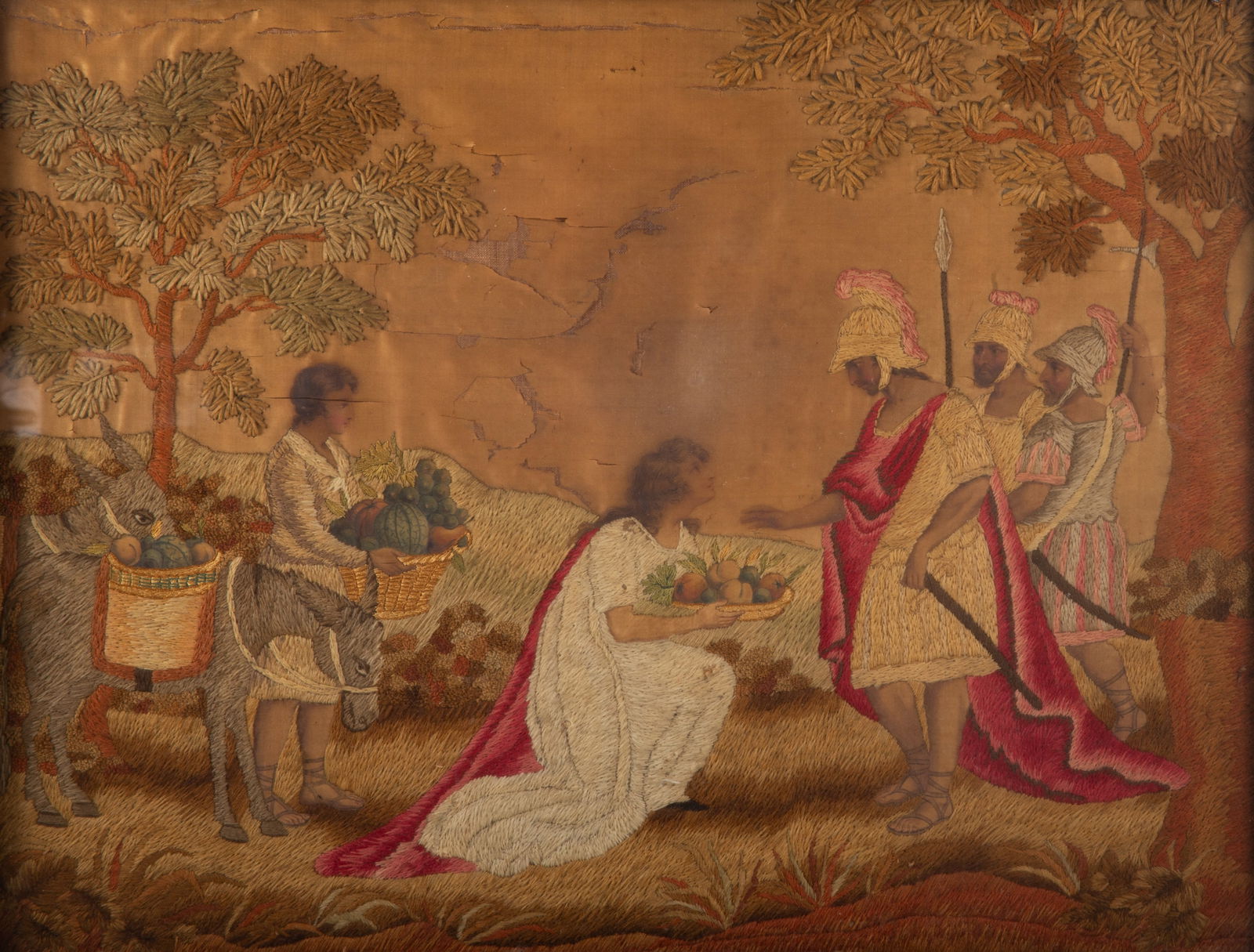 NEEDLEWORK PICTURE: Woman offering food to soldiers; classical scene on silk frame chipped; tears and toning; wear; image: 15" x 21", framed size: 21" x 27", P-F