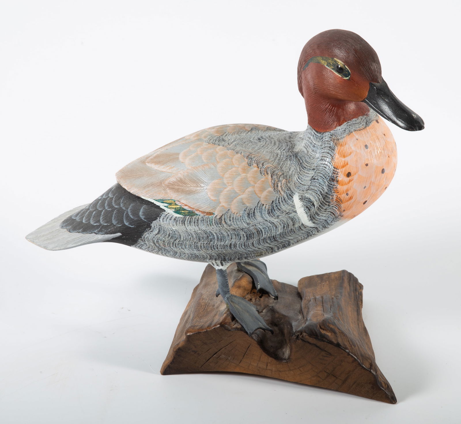 M. VEASEY GREEN WING TEAL: Carved and painted wood; standing duck on log; signed Michael Veasey 1986; normal wear; H-9 1/2", VG