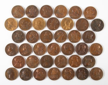 (39) BRONZE MEDALLIONS