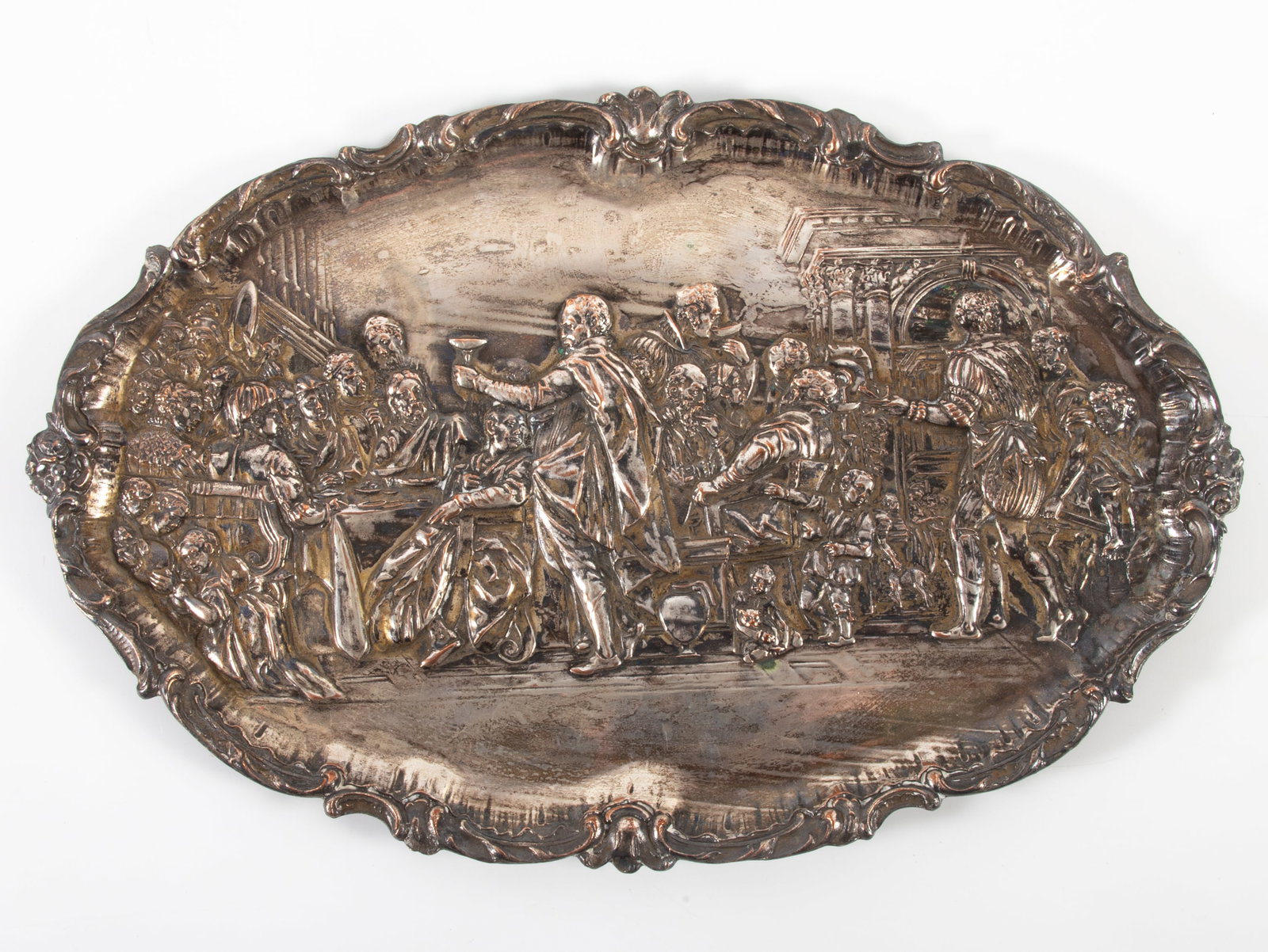 ALLEGORICAL SILVER/COPPER TRAY: Embossed courtyard scene with Jesus seated; polish wear; L-17 1/2", G-VG